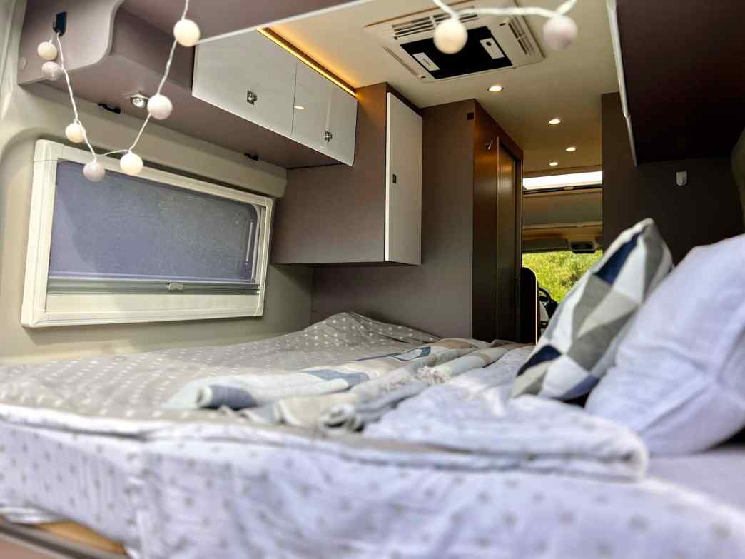 Campervan Bernie - rear bedroom view from open doors of the luxury campervan