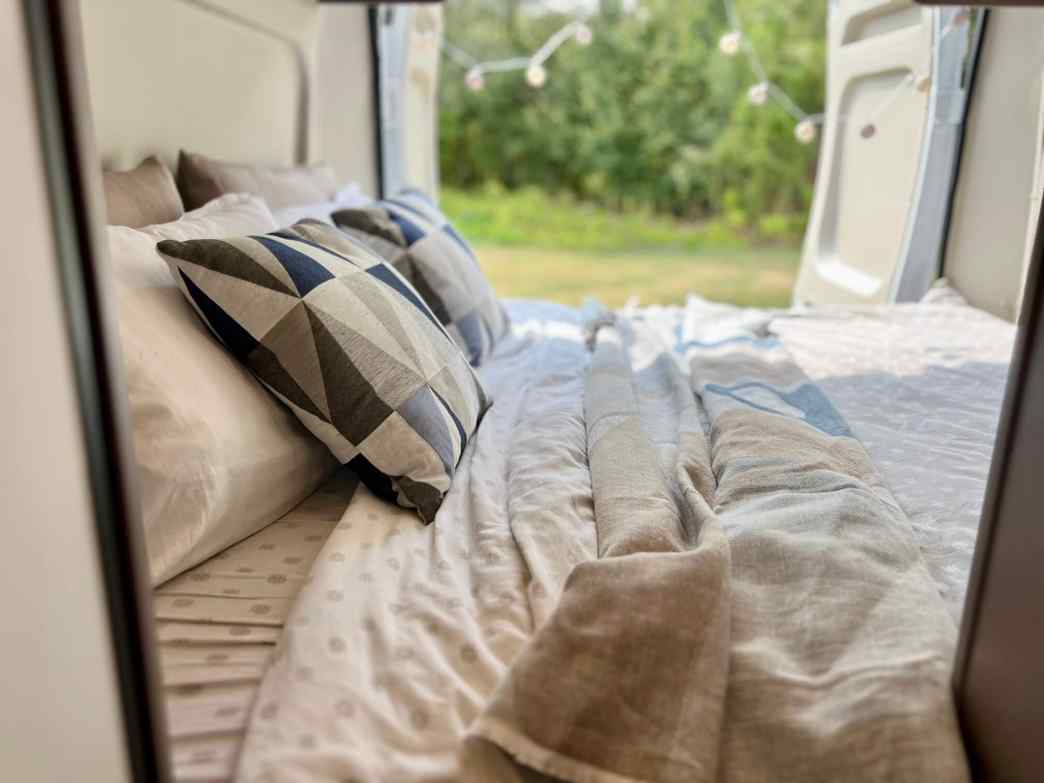Campervan Bernie - spacious rear bedroom with twin beds, joinable into one large bed