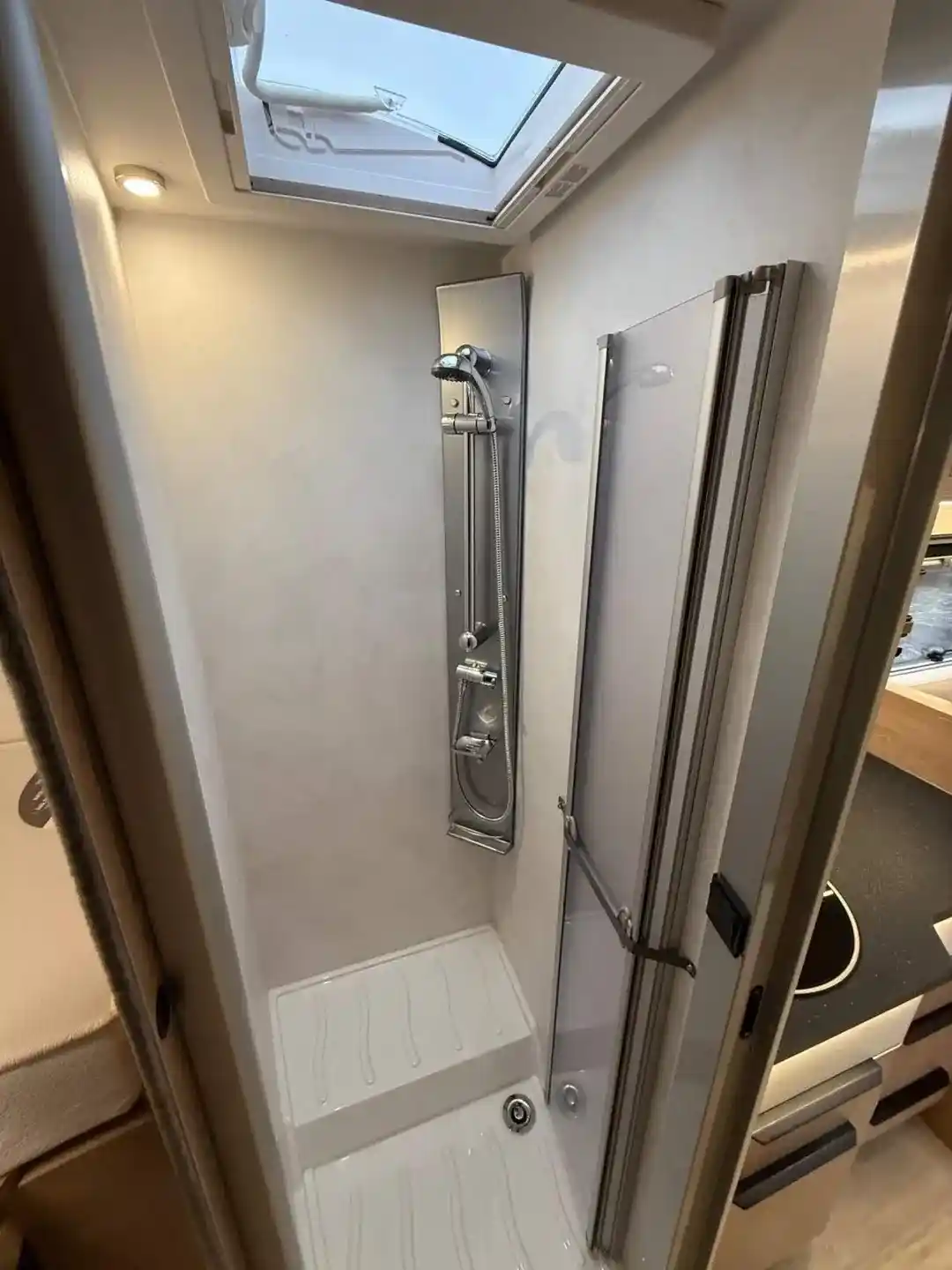 Camper Moovy - spacious bathroom with shower cabin and ventilation