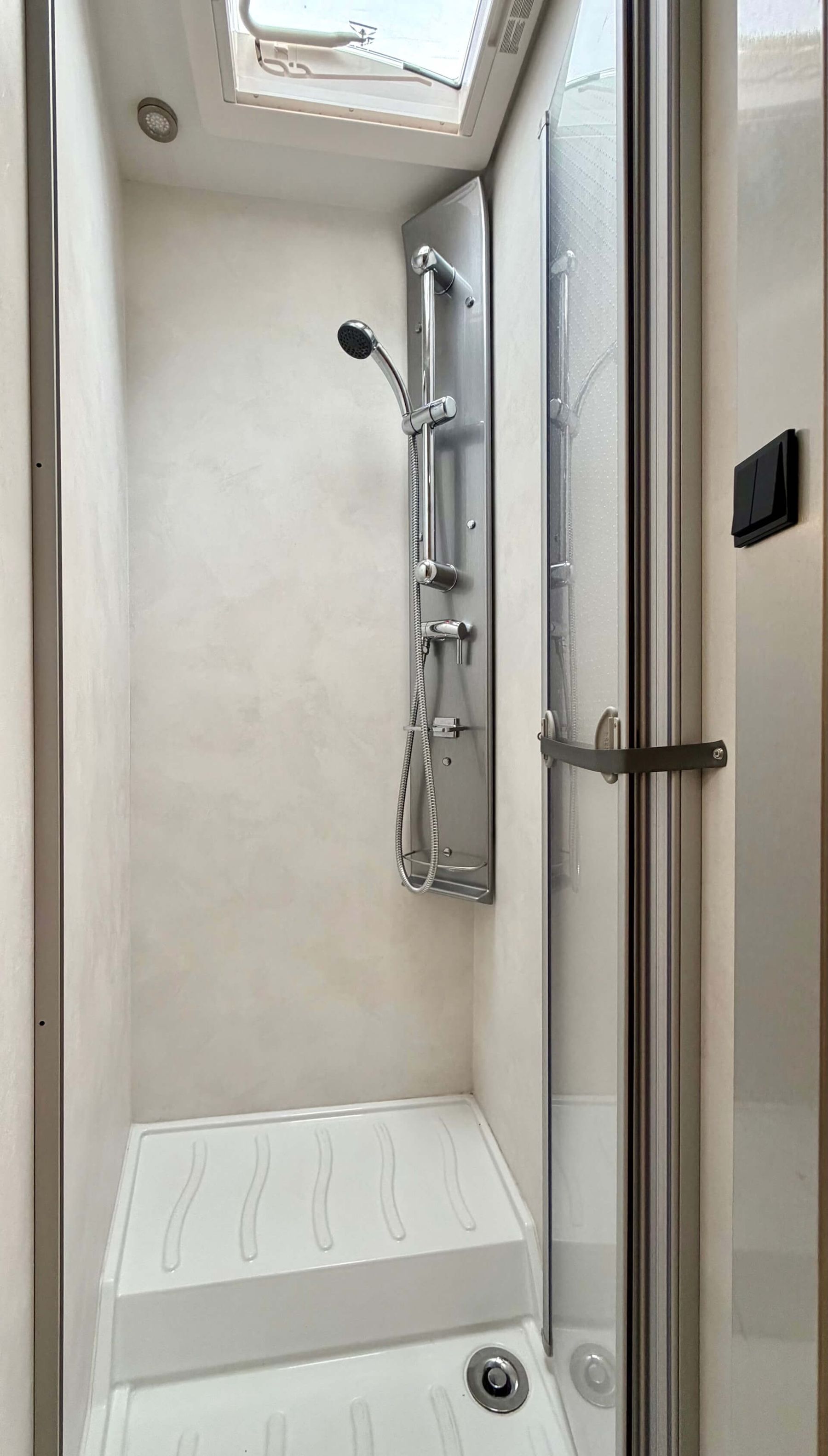Camper Moovy - spacious bathroom with shower cabin and ventilation